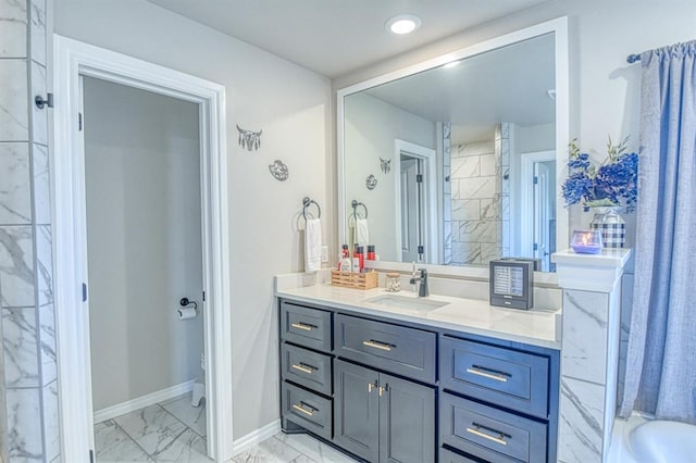9328 NW 118th St, Yukon, OK 73099 - full bath featuring vanity, marble finish floor, baseboards, and toilet