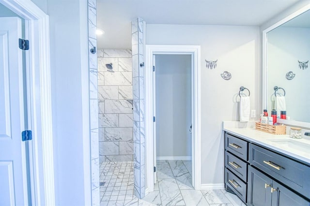 9328 NW 118th St, Yukon, OK 73099 - full bathroom with a walk in shower, marble finish floor, baseboards, and vanity