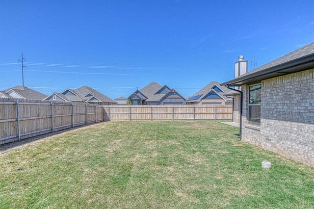 9328 NW 118th St, Yukon, OK 73099 - view of yard with a fenced backyard
