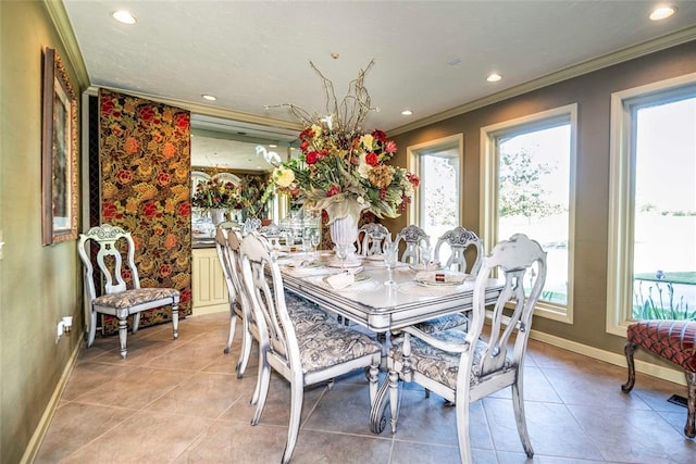 dining space with ornamental molding, baseboards, recessed lighting, and light tile patterned floors