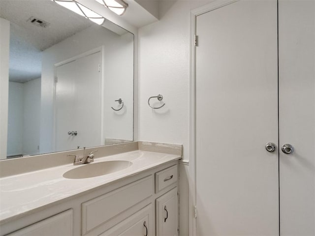 2416 Ellis Dr, Shawnee, OK 74804 - bathroom featuring vanity and visible vents