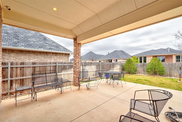 view of patio / terrace with a fenced backyard and outdoor dining space