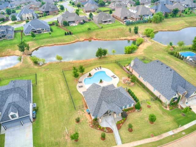 aerial view featuring a residential view and a water view