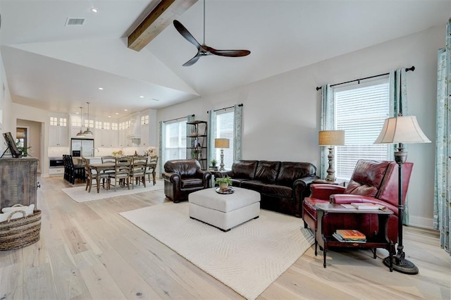 living area featuring recessed lighting, visible vents, a ceiling fan, vaulted ceiling with beams, and light wood-type flooring