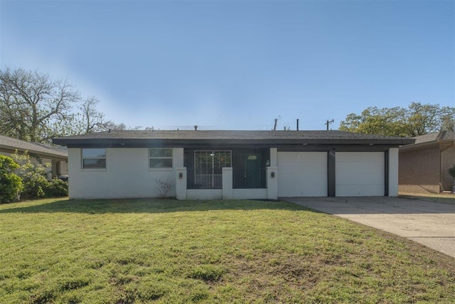 ranch-style house featuring concrete driveway, a front lawn, and an attached garage
