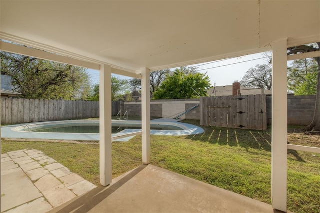 view of yard featuring a fenced in pool, a patio area, and a fenced backyard