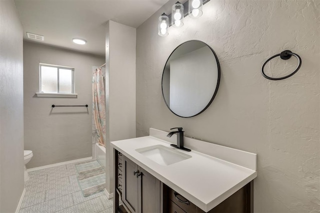 full bath featuring visible vents, shower / tub combo, baseboards, toilet, and vanity