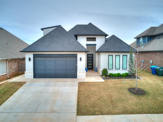 3532 Paso Robles Ter, Edmond, OK 73034 - view of front facade featuring stucco siding, a front yard, an attached garage, a shingled roof, and concrete driveway