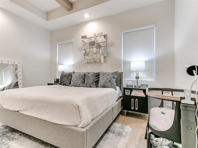 3532 Paso Robles Ter, Edmond, OK 73034 - bedroom featuring light wood-style floors and beam ceiling
