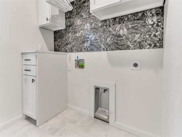 3532 Paso Robles Ter, Edmond, OK 73034 - washroom featuring hookup for an electric dryer, baseboards, hookup for a washing machine, and cabinet space