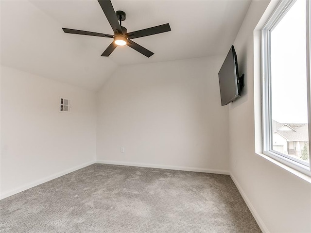 3532 Paso Robles Ter, Edmond, OK 73034 - carpeted spare room with ceiling fan, vaulted ceiling, and baseboards