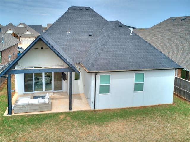 3532 Paso Robles Ter, Edmond, OK 73034 - rear view of house featuring roof with shingles, a yard, stucco siding, and fence