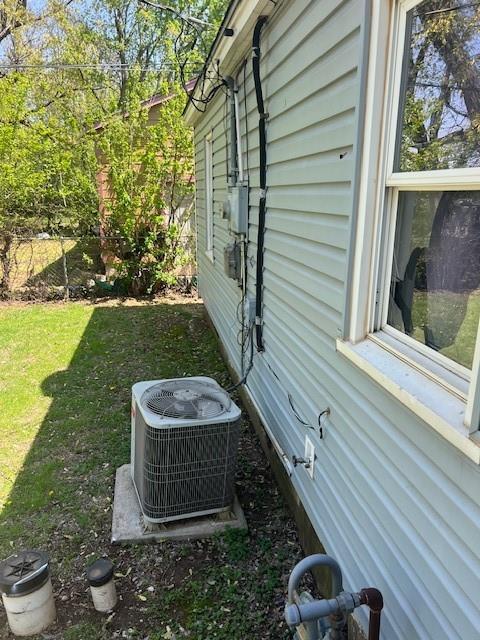 3741 SW 43rd St, Oklahoma City, OK 73119 - exterior details with electric meter and central AC