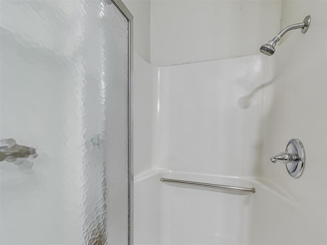 full bath featuring a stall shower