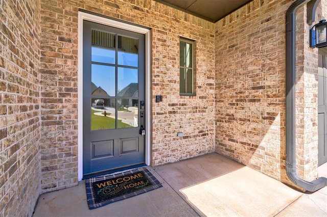 101 Pont Neuf Ct, Edmond, OK 73034 - property entrance featuring brick siding