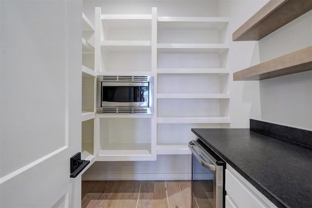 101 Pont Neuf Ct, Edmond, OK 73034 - pantry with wine cooler