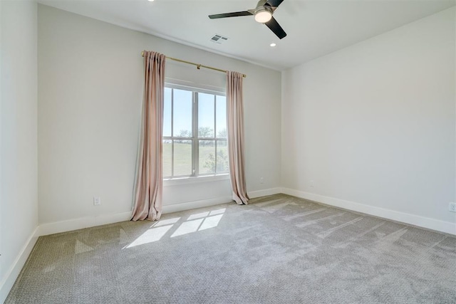 101 Pont Neuf Ct, Edmond, OK 73034 - spare room with visible vents, baseboards, ceiling fan, recessed lighting, and light carpet