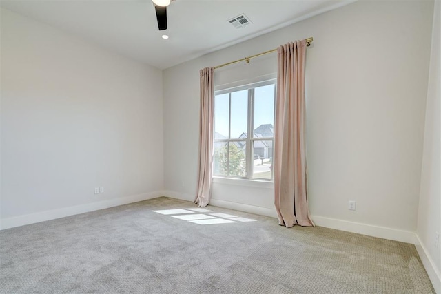 101 Pont Neuf Ct, Edmond, OK 73034 - carpeted empty room featuring visible vents, baseboards, and ceiling fan