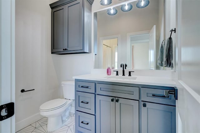 101 Pont Neuf Ct, Edmond, OK 73034 - bathroom with tile patterned floors, vanity, and toilet