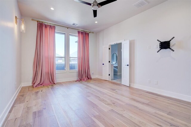 101 Pont Neuf Ct, Edmond, OK 73034 - interior space with light wood-style floors, ceiling fan, baseboards, and visible vents