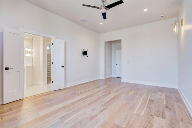 101 Pont Neuf Ct, Edmond, OK 73034 - empty room featuring baseboards, light wood-style floors, visible vents, and a ceiling fan