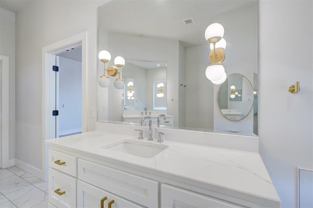 101 Pont Neuf Ct, Edmond, OK 73034 - bathroom with vanity, visible vents, and marble finish floor