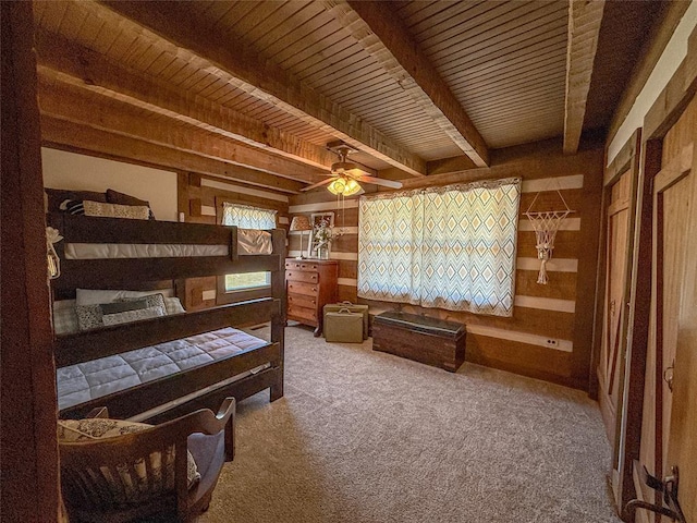 31230 N County Road 3170, Elmore City, OK 73433 - carpeted bedroom featuring wooden walls, wooden ceiling, and beamed ceiling