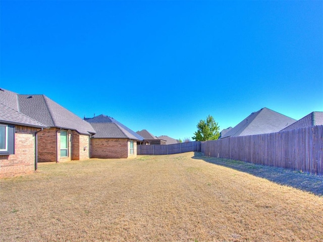 15213 Wilford Way, Edmond, OK 73013 - view of yard featuring a fenced backyard