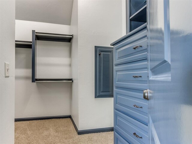 15213 Wilford Way, Edmond, OK 73013 - spacious closet with carpet flooring