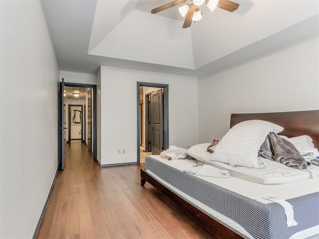 15213 Wilford Way, Edmond, OK 73013 - bedroom featuring ceiling fan, baseboards, and wood finished floors