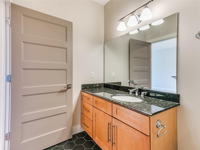 bathroom featuring vanity and tile patterned flooring
