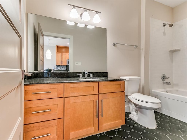 full bathroom featuring shower / washtub combination, toilet, tile patterned flooring, and vanity