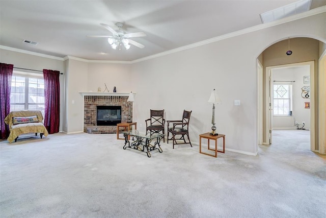 4408 32nd Pl, Oklahoma City, OK 73112 - living area with a wealth of natural light, arched walkways, visible vents, and a ceiling fan