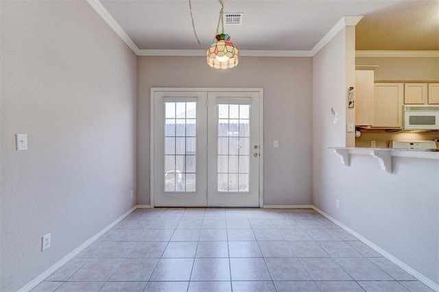 4408 32nd Pl, Oklahoma City, OK 73112 - doorway to outside featuring crown molding, visible vents, baseboards, and french doors
