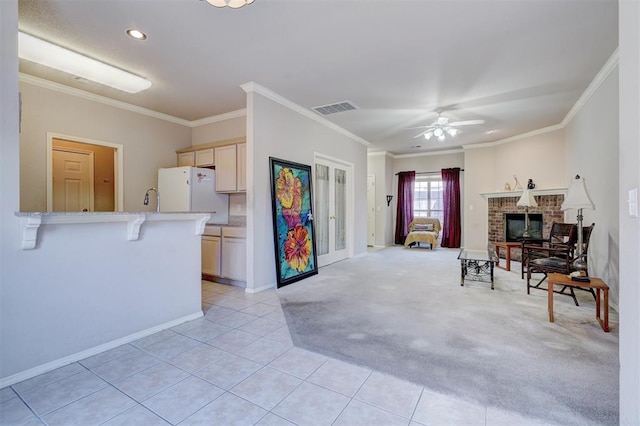 4408 32nd Pl, Oklahoma City, OK 73112 - living room featuring baseboards, recessed lighting, light tile patterned floors, crown molding, and visible vents