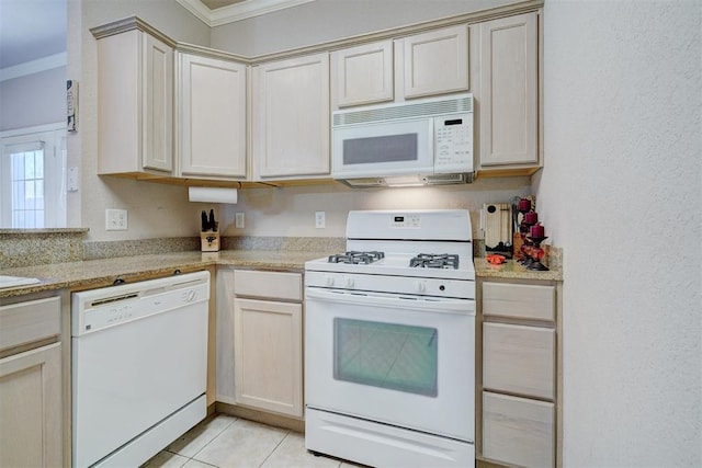 4408 32nd Pl, Oklahoma City, OK 73112 - kitchen featuring ornamental molding, white appliances, and light tile patterned floors