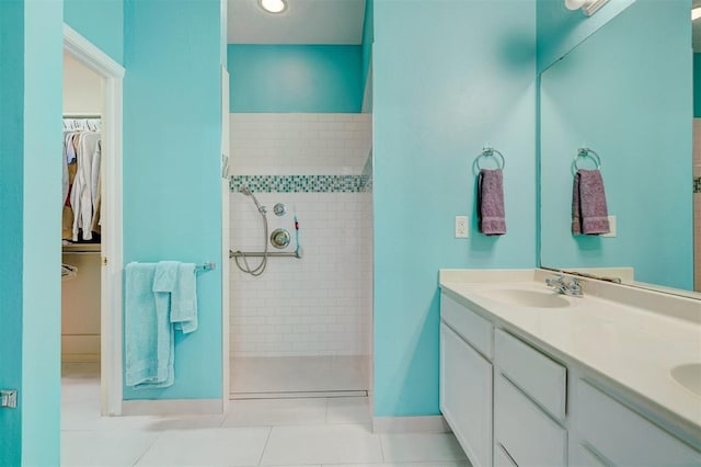 4408 32nd Pl, Oklahoma City, OK 73112 - full bath featuring double vanity, a sink, a spacious closet, and walk in shower