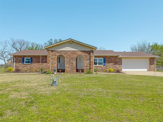 ranch-style house with concrete driveway, a front yard, brick siding, and a garage