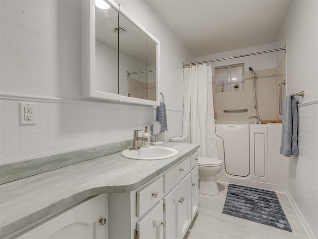 bathroom featuring vanity, curtained shower, a bathtub, toilet, and visible vents