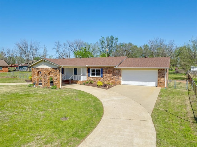 ranch-style home with brick siding, a front lawn, fence, and an attached garage