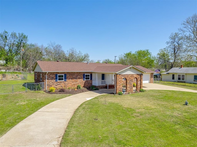 ranch-style home with brick siding, a front lawn, fence, and driveway