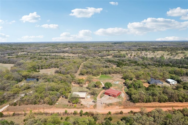 aerial view with a wooded view
