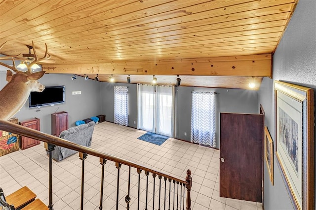 interior space with track lighting, tile patterned floors, wooden ceiling, and a ceiling fan