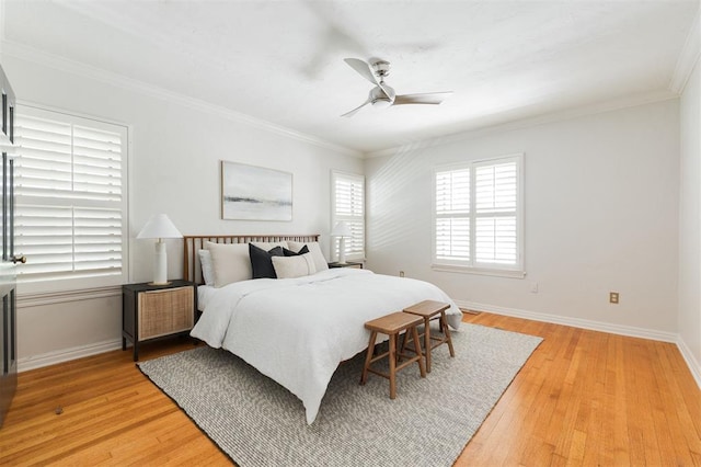 905 NW 40th St, Oklahoma City, OK 73118 - bedroom with light wood-style floors, baseboards, crown molding, and ceiling fan