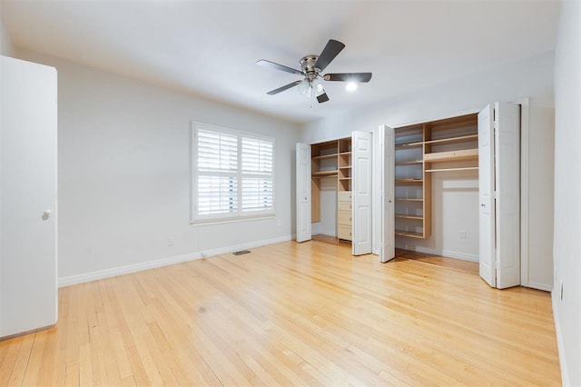 905 NW 40th St, Oklahoma City, OK 73118 - unfurnished bedroom with baseboards, light wood-type flooring, visible vents, multiple closets, and ceiling fan
