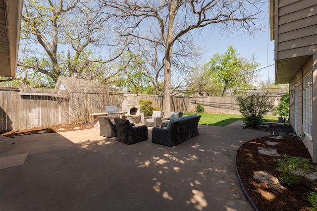 905 NW 40th St, Oklahoma City, OK 73118 - view of patio with an outdoor living space, grilling area, and a fenced backyard