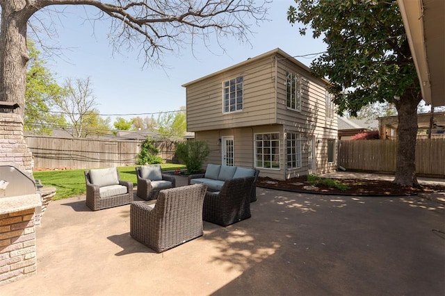 905 NW 40th St, Oklahoma City, OK 73118 - view of patio / terrace with outdoor lounge area and a fenced backyard