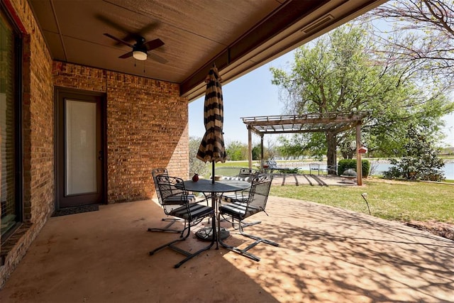 2293 Cottage Ln, Blanchard, OK 73010 - view of patio / terrace with a pergola, a ceiling fan, and outdoor dining space
