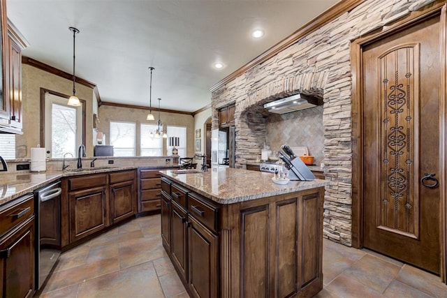 2293 Cottage Ln, Blanchard, OK 73010 - kitchen with dishwasher, ornamental molding, wall chimney exhaust hood, light stone counters, and decorative light fixtures