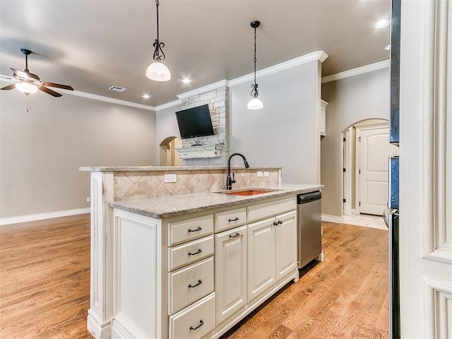 13340 Greenscape Rd, Piedmont, OK 73078 - kitchen featuring crown molding, ceiling fan, arched walkways, dishwasher, and a sink